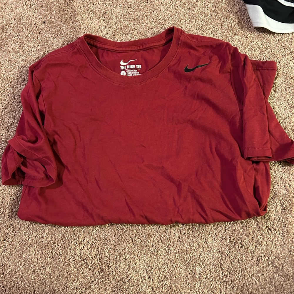A pair of men’s Nike shirt